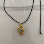 Fluid eye necklace