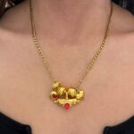gold charm necklace , jewllery brand collection , necklace for woman