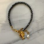 Hematite fish charm bracelet