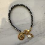 Hematite evil eye  charm bracelet