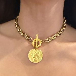 coin jewllery , gold charm bracelet , greek jewllery brand , statement jewllery collection , coin necklace , bold chunky jewllery , retro vintage style , medallion bracelet , Ancient Greek style ,