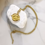 coin charm necklace with eye