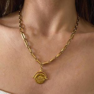 coin jewllery , gold charm bracelet , greek jewllery brand , statement jewllery collection , coin necklace , bold chunky jewllery , retro vintage style , medallion bracelet , Ancient Greek style , evil eye jewllery